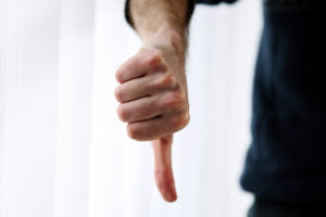 Thumbs down indicating client rejection