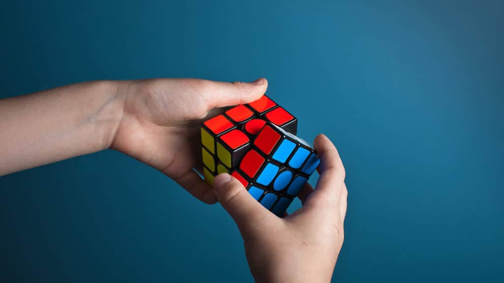 Solving a Rubik's Cube - Olav Ahrens Rotne on Unsplash