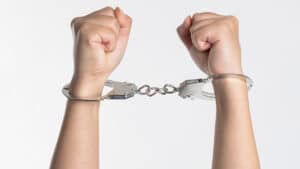 Handcuffs Symbolize Rules For Influencer Marketing